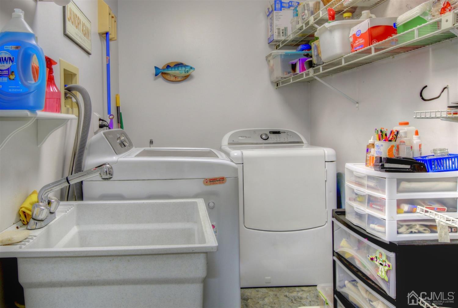 11 Walnut Court Old Bridge, NJ 07747 - Photo 17 of 32 a utility room with dryer and washer