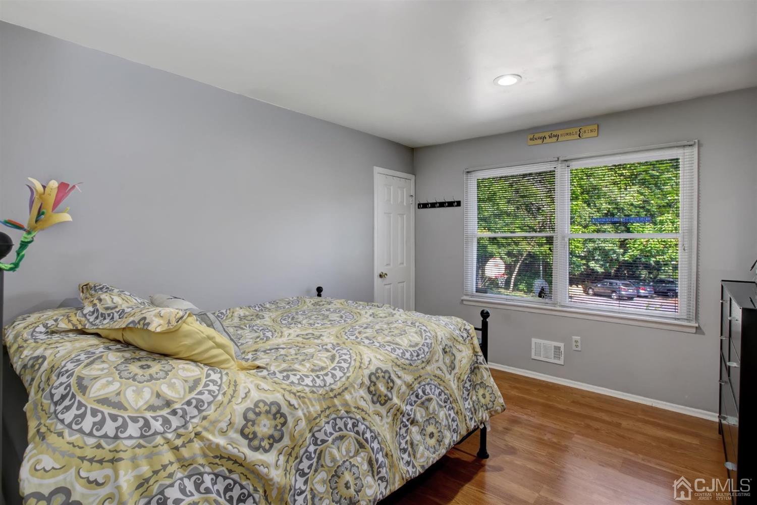 11 Walnut Court Old Bridge, NJ 07747 - Photo 23 of 32 a bedroom with a bed and a window