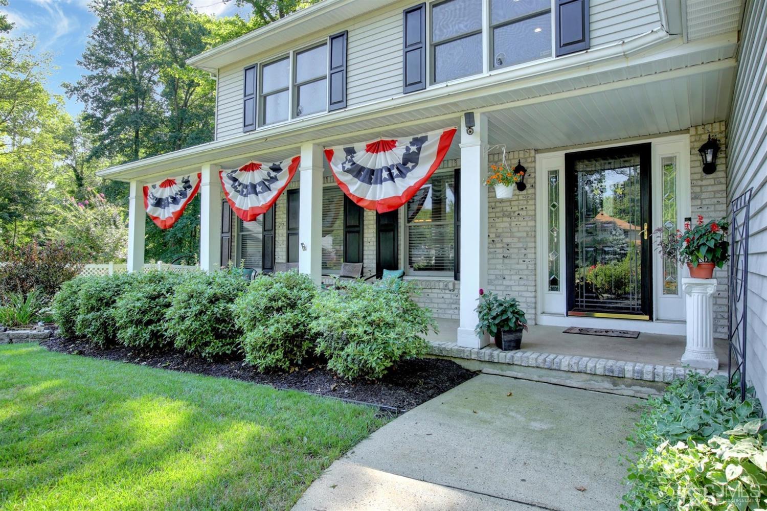 11 Walnut Court Old Bridge, NJ 07747 - Photo 4 of 32 a front view of multi story residential apartment building with yard