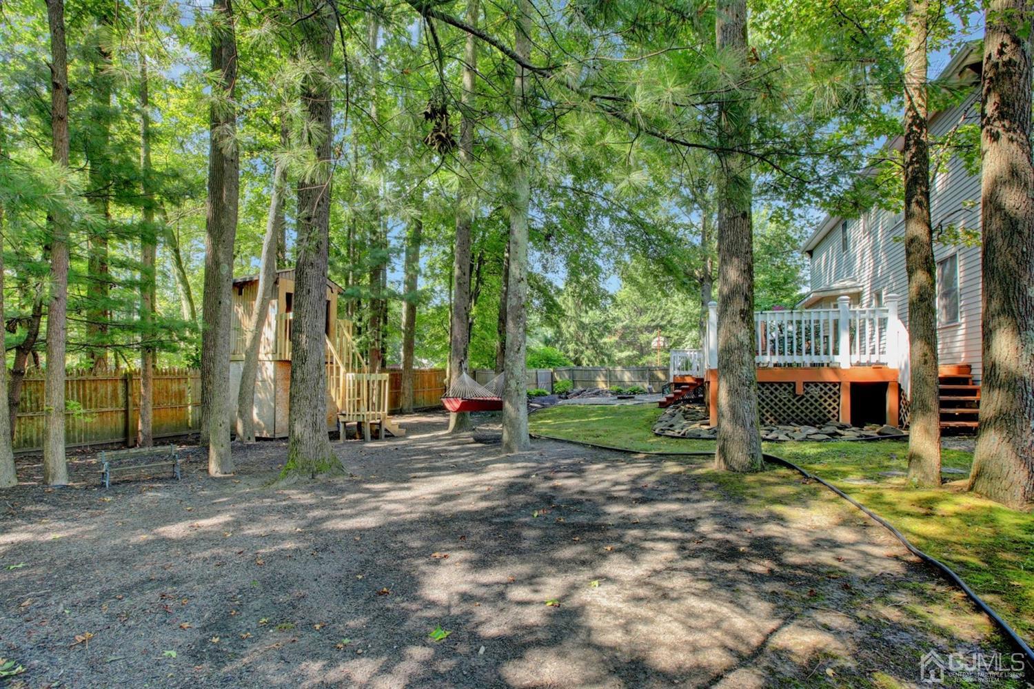 11 Walnut Court Old Bridge, NJ 07747 - Photo 31 of 32 a view of a park with large trees