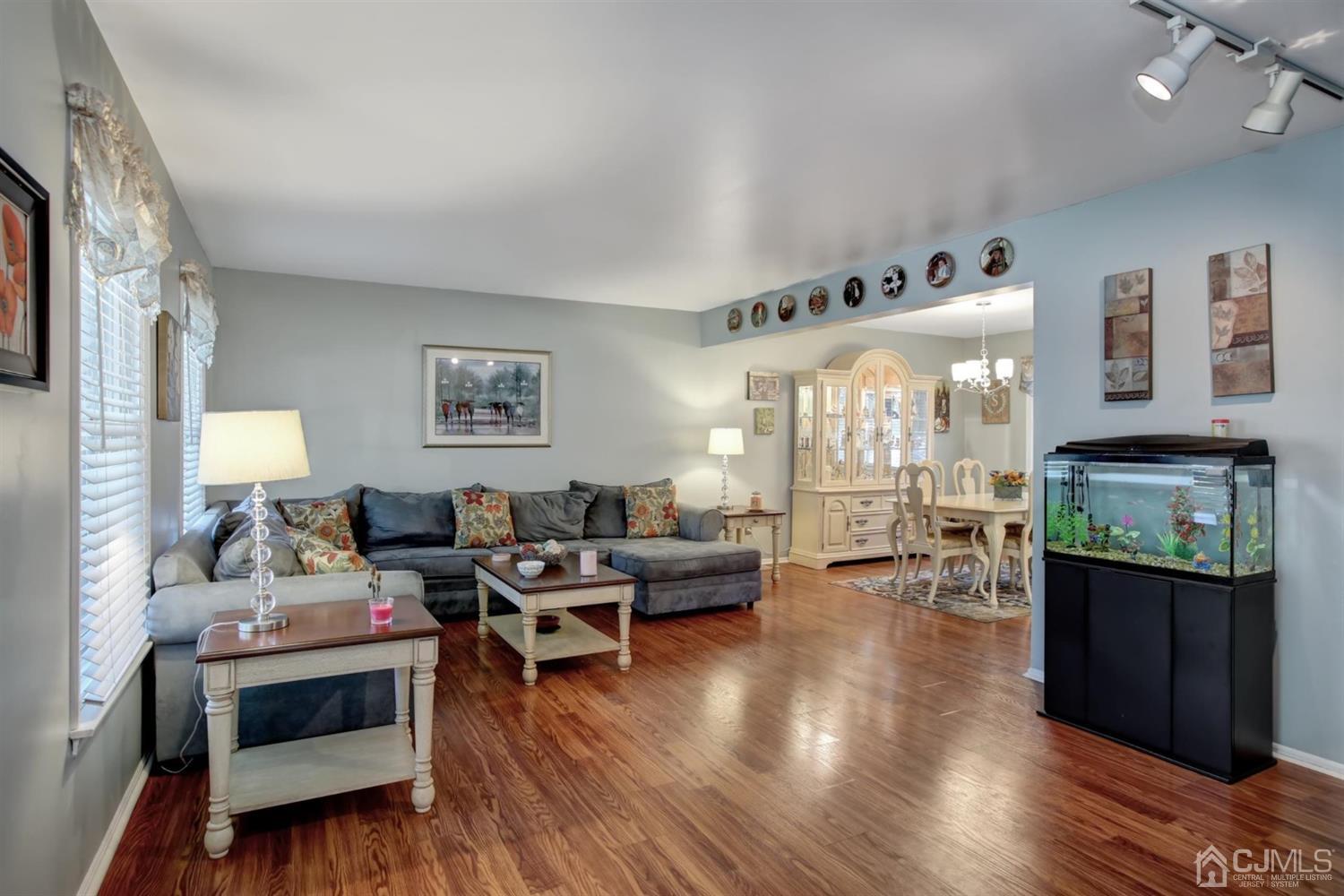 11 Walnut Court Old Bridge, NJ 07747 - Photo 5 of 32 a living room with furniture and wooden floor