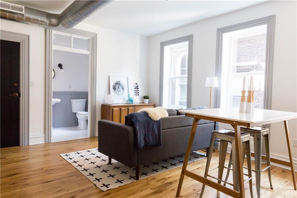 4407 Butler Street Pittsburgh, PA 15201 - Photo 16 of 29 a living room with furniture and a table