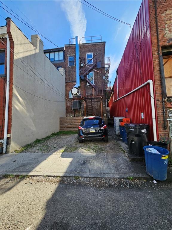 4407 Butler Street Pittsburgh, PA 15201 - Photo 25 of 29 a view of a car park in front of a house