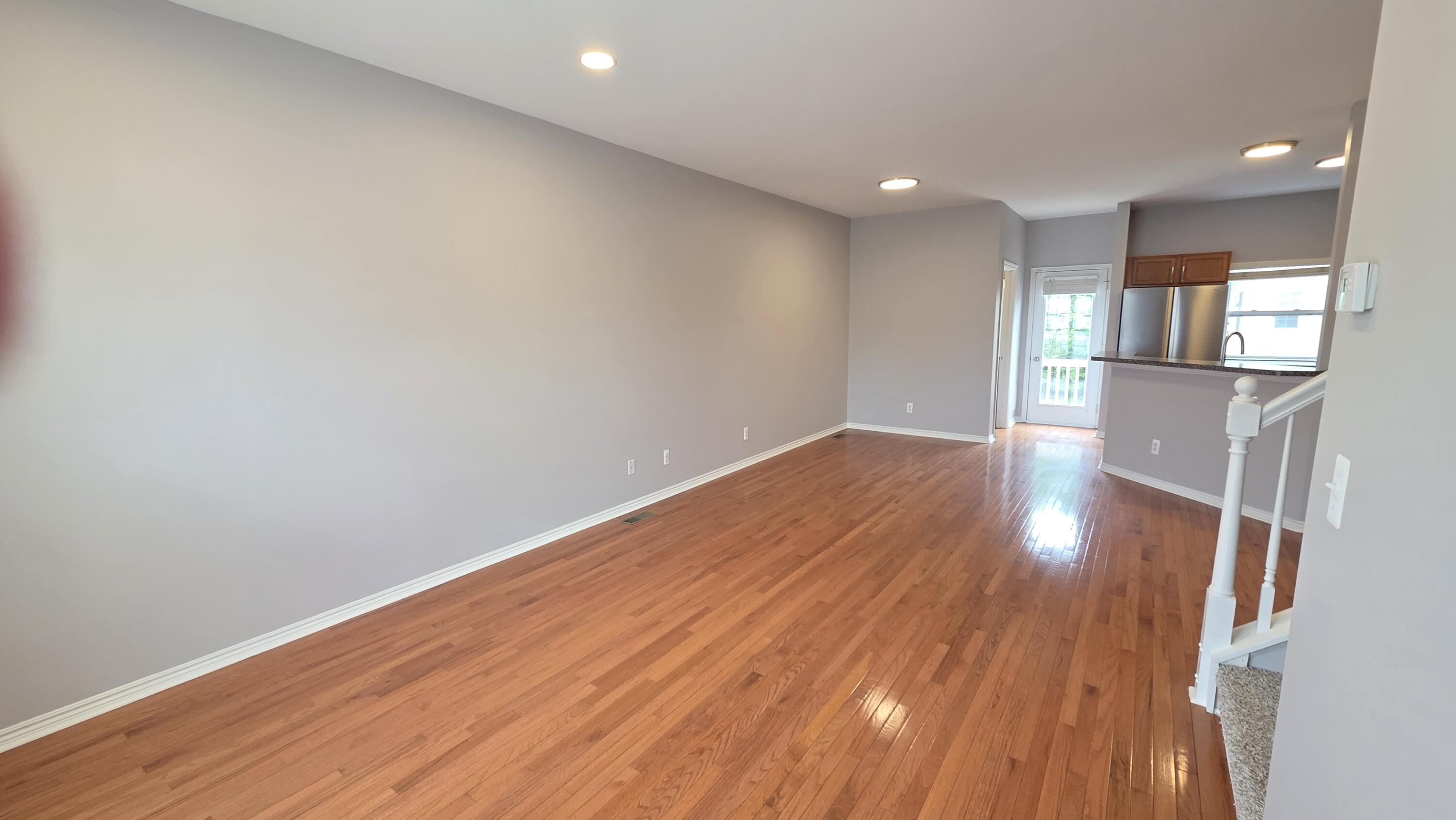 1563 Cass Lake Road Keego Harbor, MI 48320 - Photo 7 of 23 living/dining area
