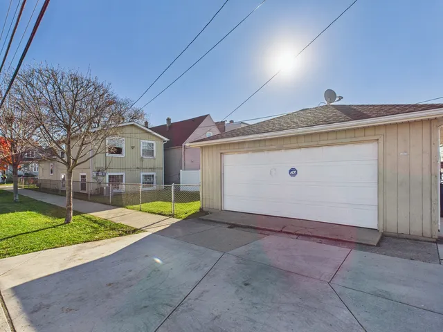 a view of pool with yard