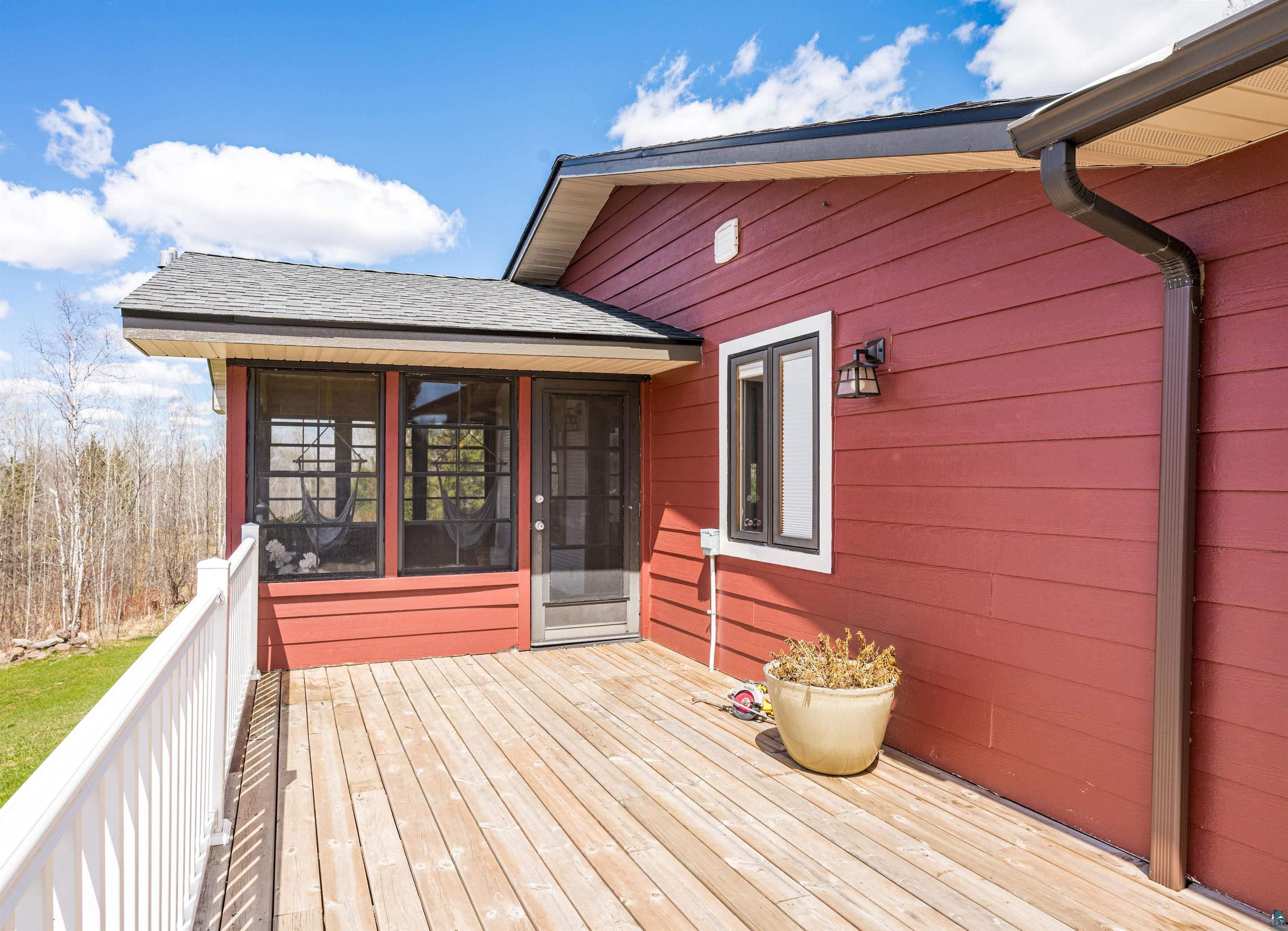 3325 Strand Road Duluth, MN 55803 - Photo 6 of 25 Spacious deck off charming sunroom.