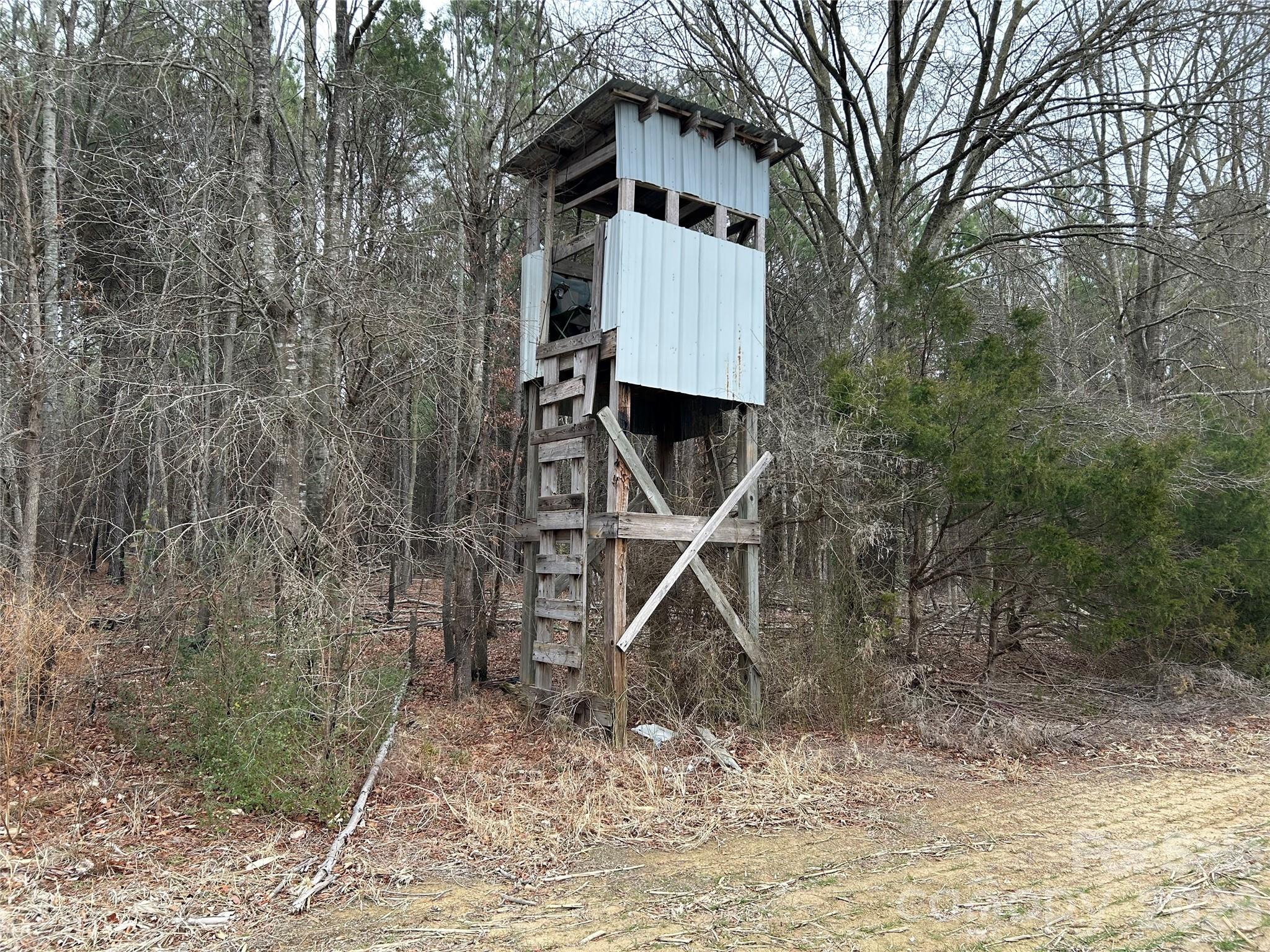 1440 Carl Taylor Road Peachland, NC 28133 - Photo 9 of 21 a sign board with buildings in the background