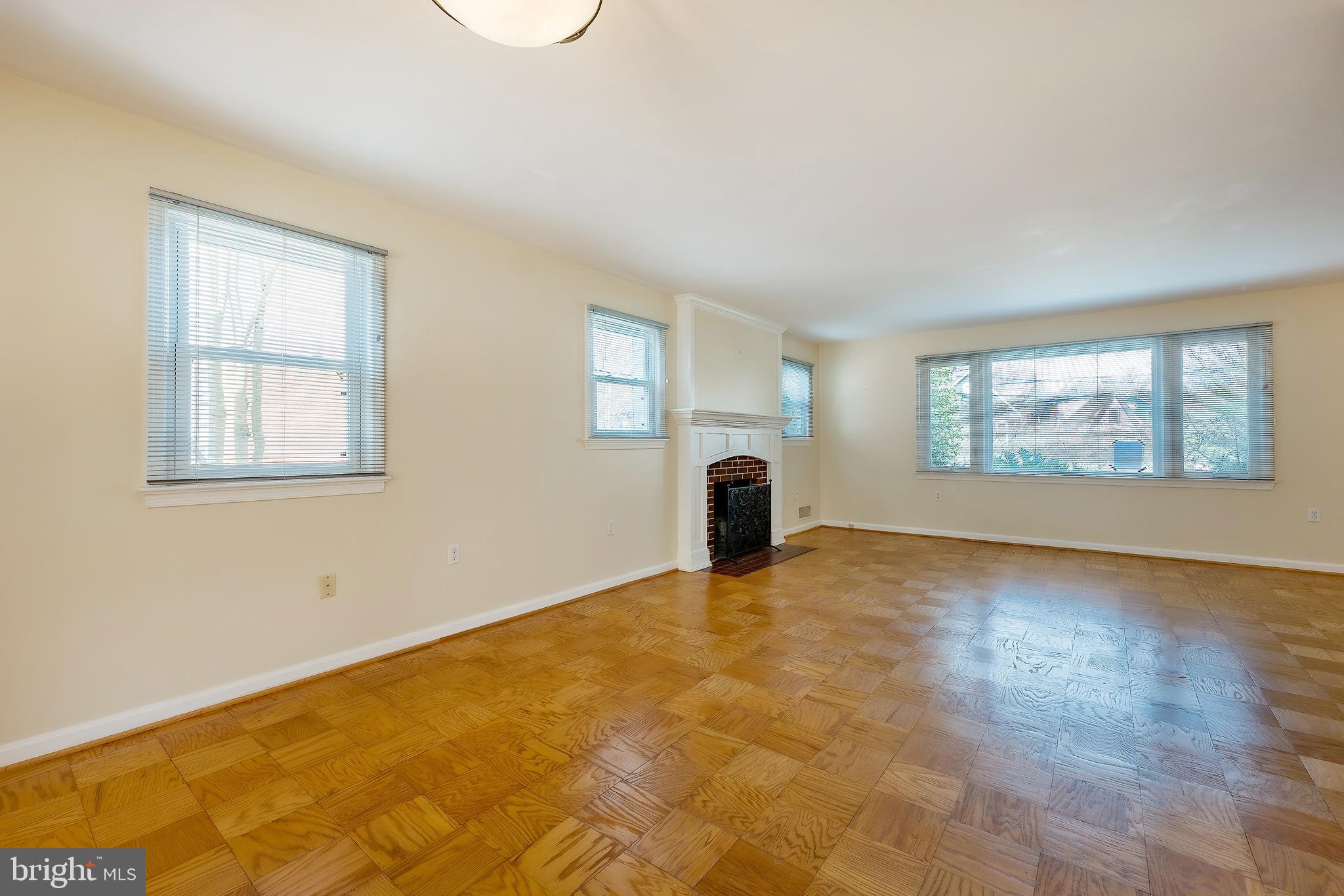 6504 Stratford Road Chevy Chase, MD 20815 - Photo 12 of 54 a view of an empty room with windows