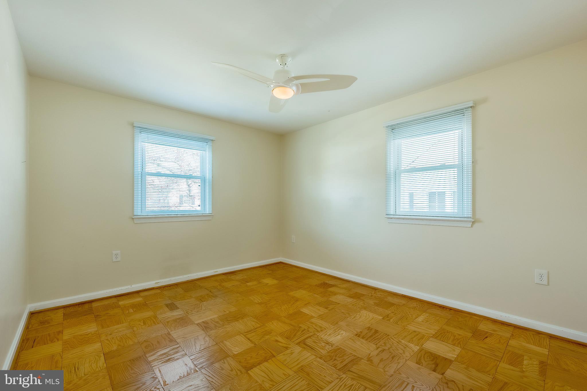 6504 Stratford Road Chevy Chase, MD 20815 - Photo 29 of 54 a view of a room with a window and ceiling fan