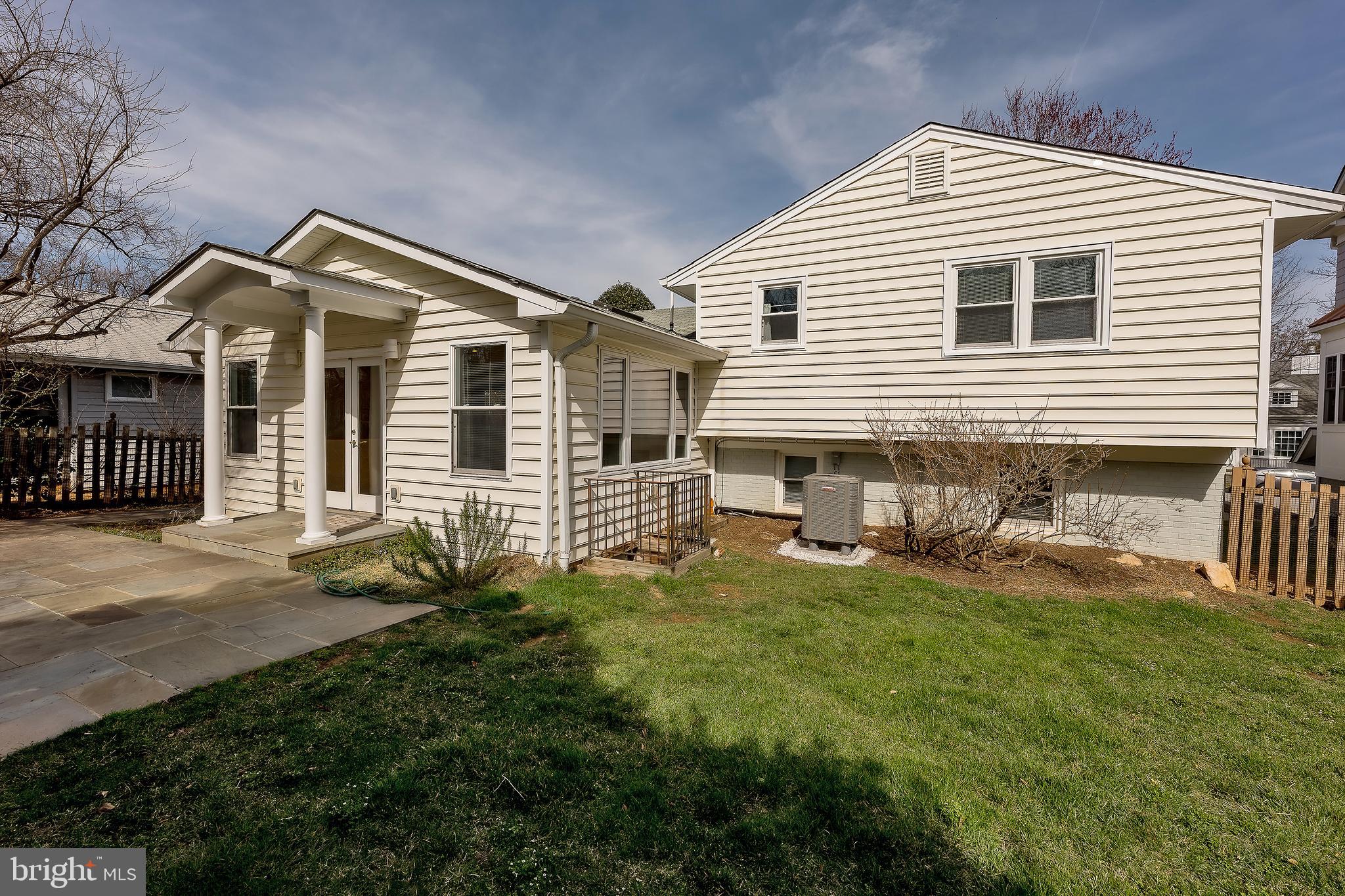 6504 Stratford Road Chevy Chase, MD 20815 - Photo 52 of 54 a front view of a house with a yard