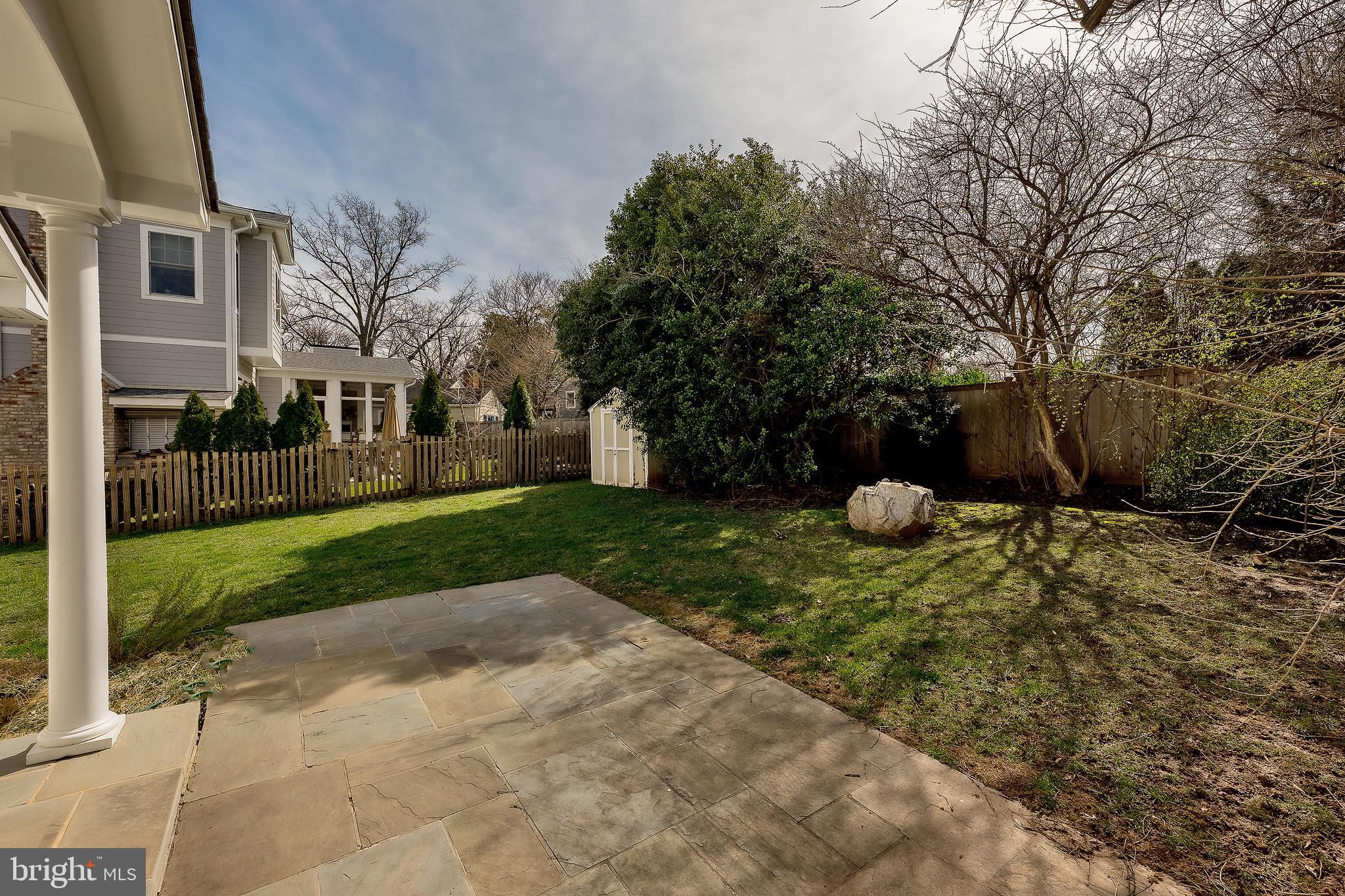 6504 Stratford Road Chevy Chase, MD 20815 - Photo 54 of 54 a backyard of a house with lots of green space