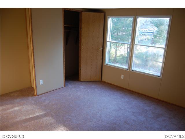 11051 Genito Road Amelia Court House, VA 23002 - Photo 12 of 12 Bedroom - 2nd bedroom in right end of home.