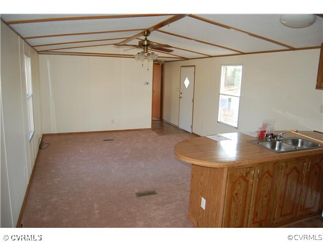 Kitchen - view from kitchen into living room and f