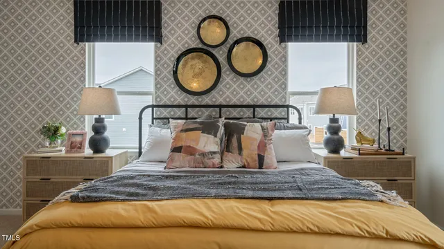 a bed room with a bed and a window