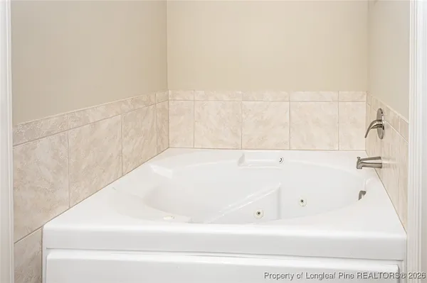 a bathroom with a bathtub