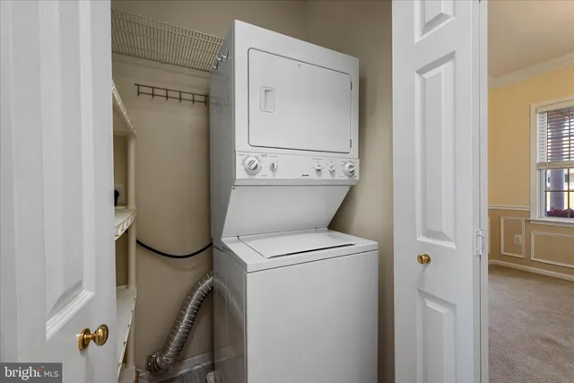a bathroom with a sink a toilet and shower curtain