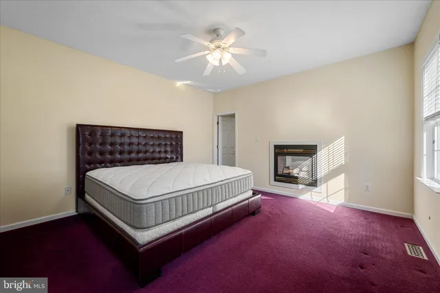 a view of empty room with windows