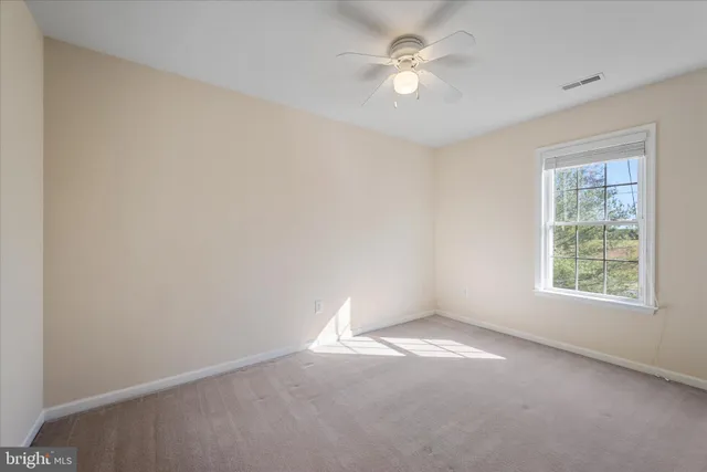 an aerial view of a house with a yard lake view and mountain view