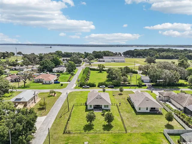 an aerial view of a house with a garden
