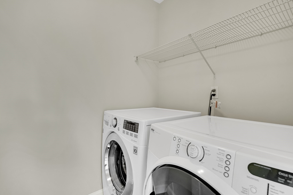 49 Quarry Road, Unit 49 Acton, MA 01720 - Photo 22 of 42 a utility room with dryer and washer