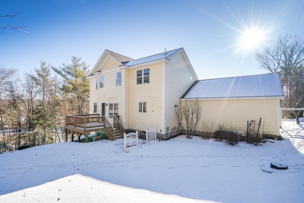 49 Quarry Road, Unit 49 Acton, MA 01720 - Photo 27 of 42 a view of a backyard