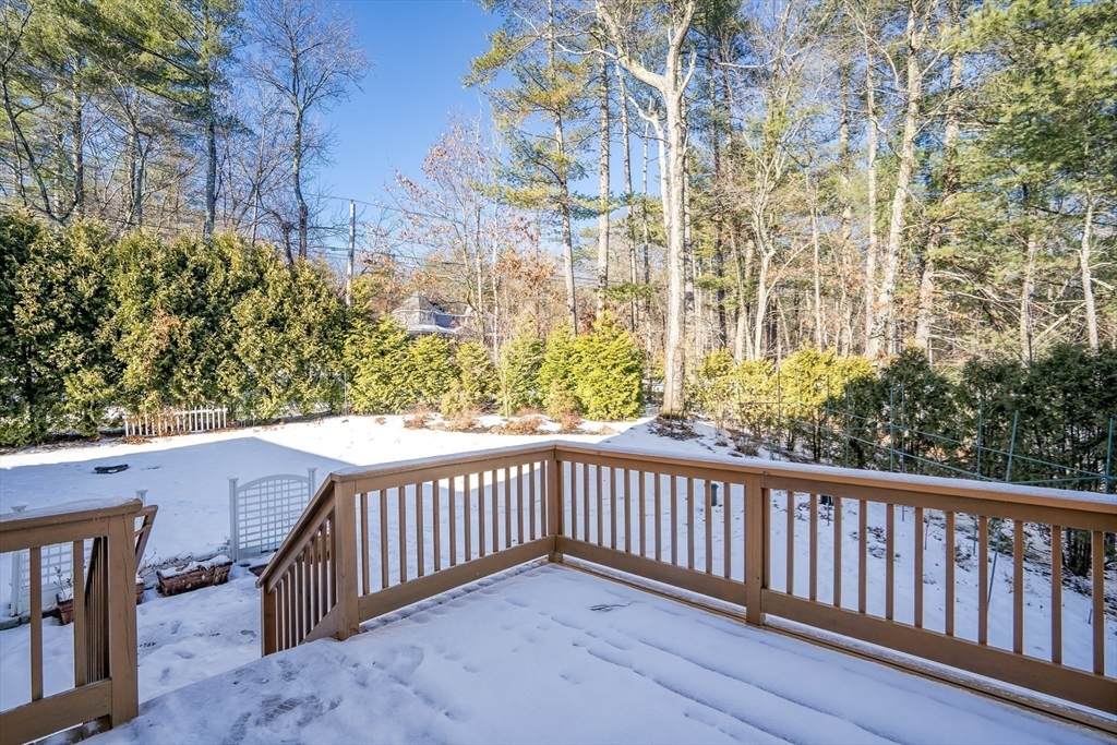 49 Quarry Road, Unit 49 Acton, MA 01720 - Photo 28 of 42 a view of a balcony with wooden fence
