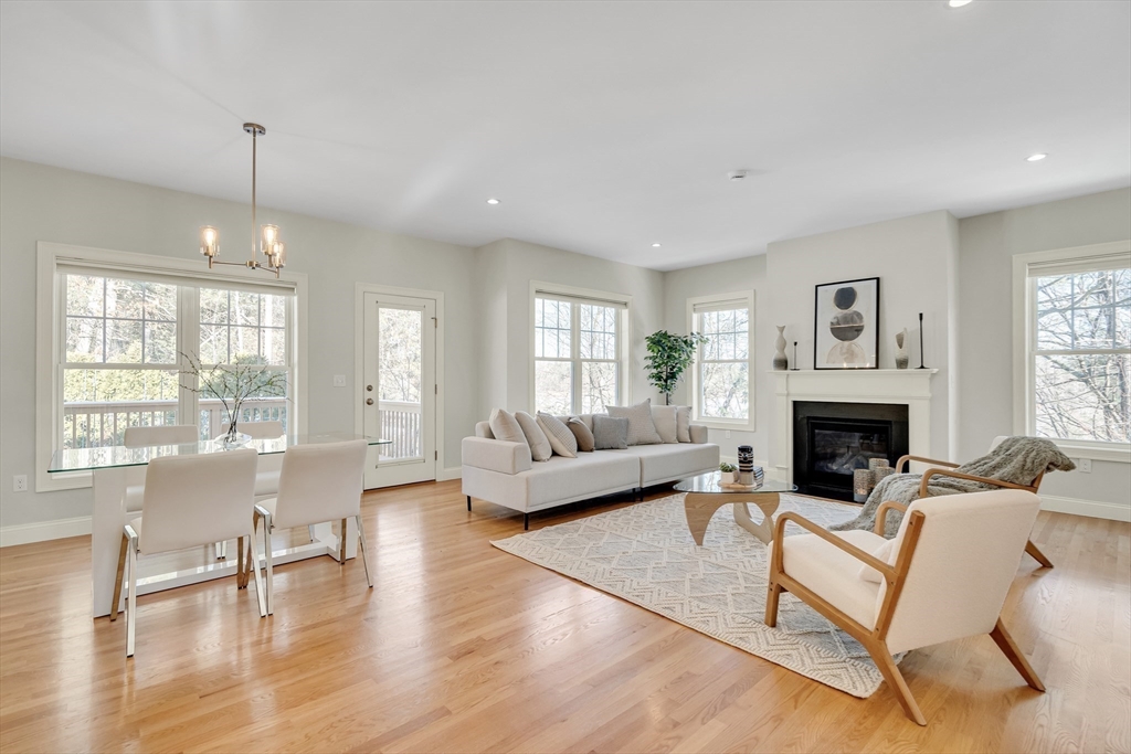 49 Quarry Road, Unit 49 Acton, MA 01720 - Photo 9 of 42 a living room with furniture and a fireplace