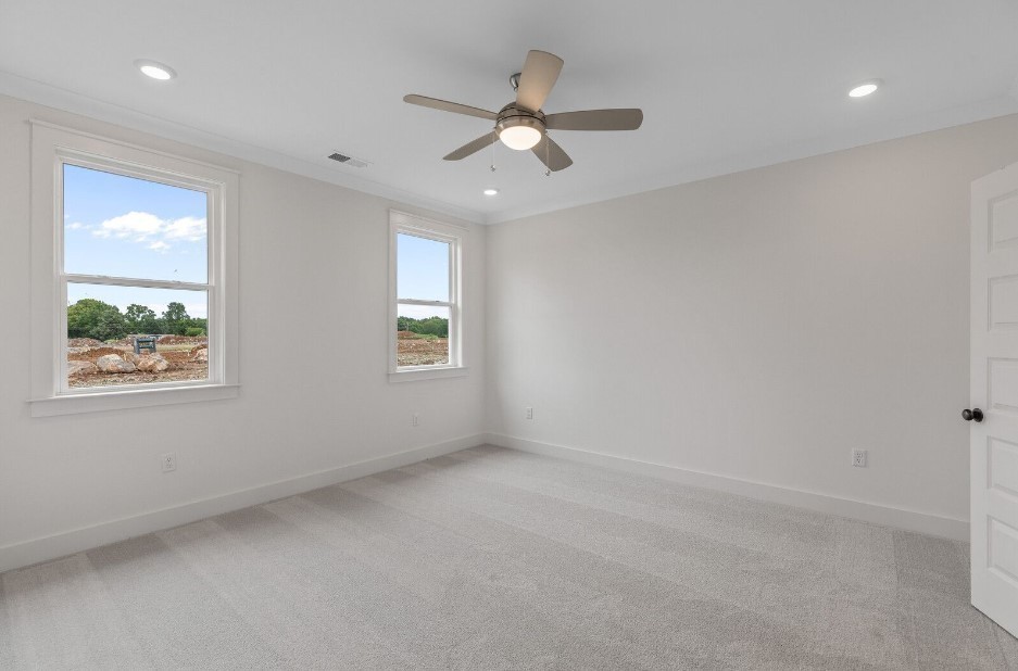 826 Sugarbush Ln Spring Hill Spring Hill, TN 37174 - Photo 12 of 18 an empty room with a window and a ceiling fan