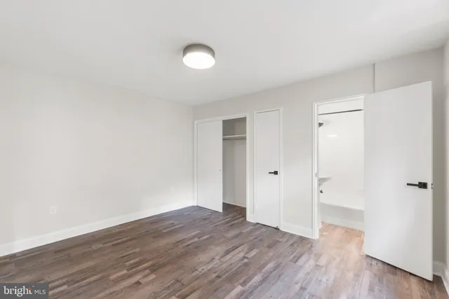 a view of a livingroom with wooden floor