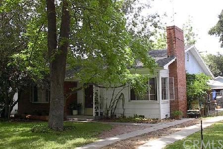 7141 Potomac Street Riverside, CA 92504 - Photo 1 of 1 a view of a house with backyard and trees
