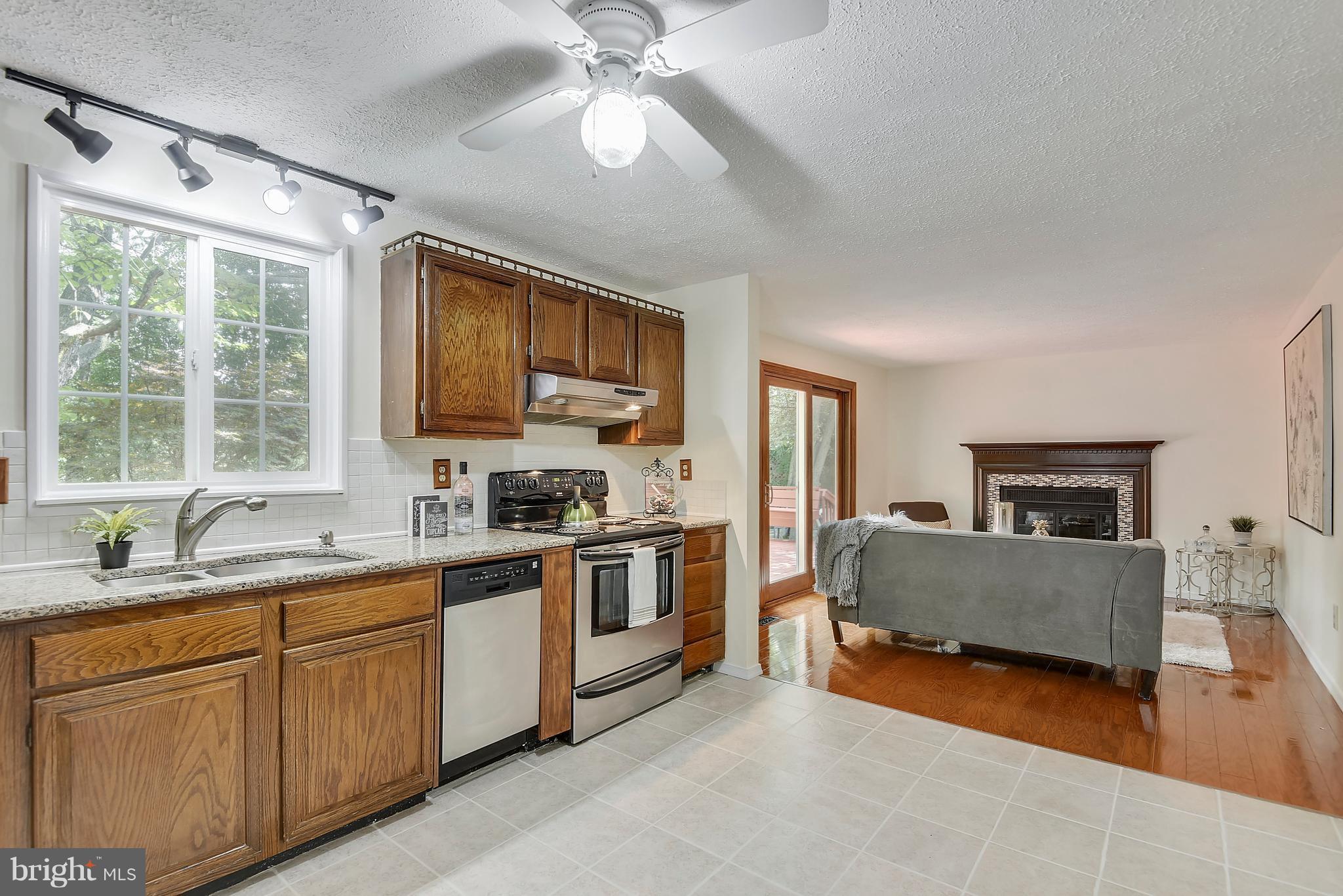 Kitchen just off family room with quick deck acces