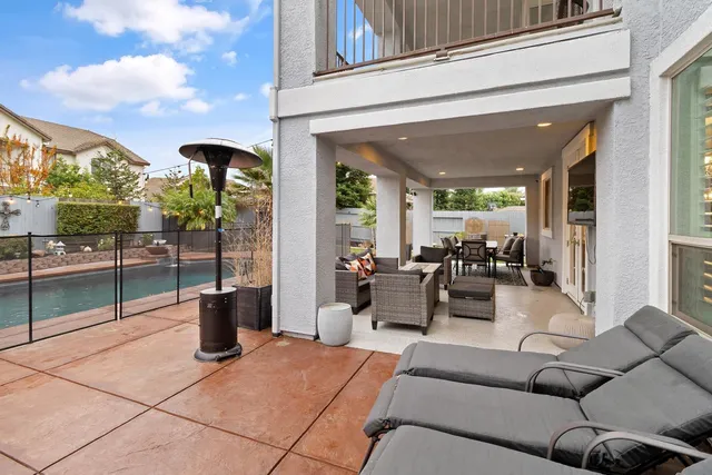 a front view of a house with swimming pool