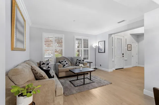 a living room with furniture and window