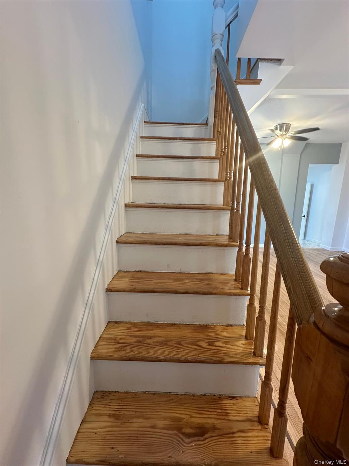 218-17 109th Avenue Queens, NY 11429 - Photo 22 of 35 Stairs featuring wood finished floors and ceiling fan
