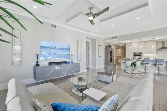 a living room with furniture and a table