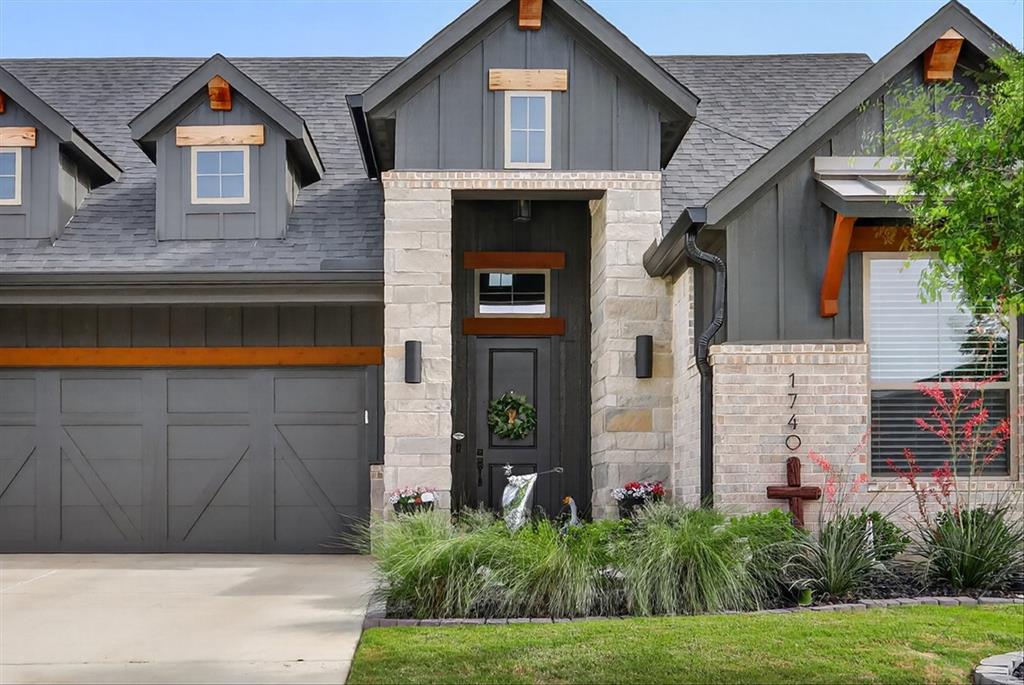 1740 Reverie Road Burleson, TX 76028 - Photo 3 of 37 a front view of a house with a yard