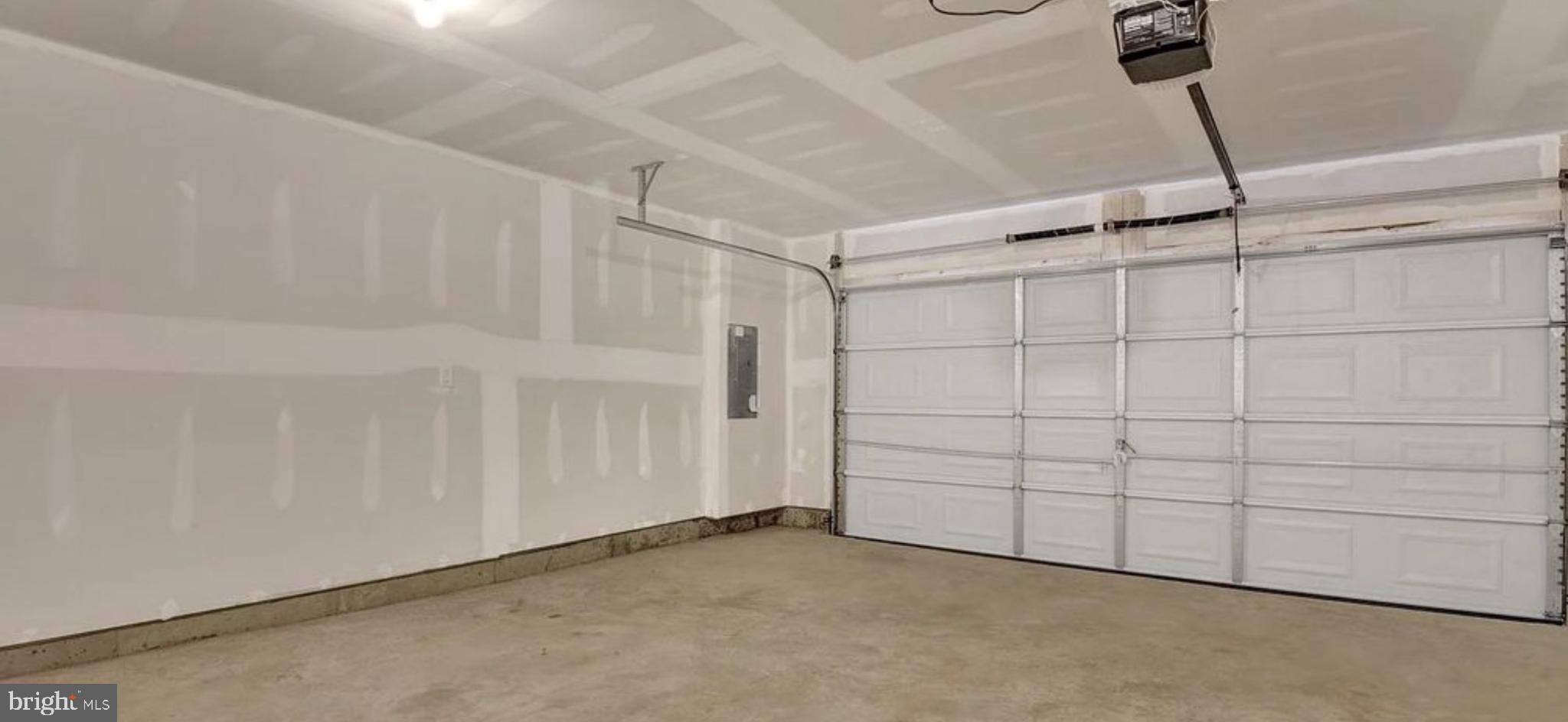 409 Eclipse Street Ranson, WV 25438 - Photo 2 of 14 Spacious garage ready for your projects.
