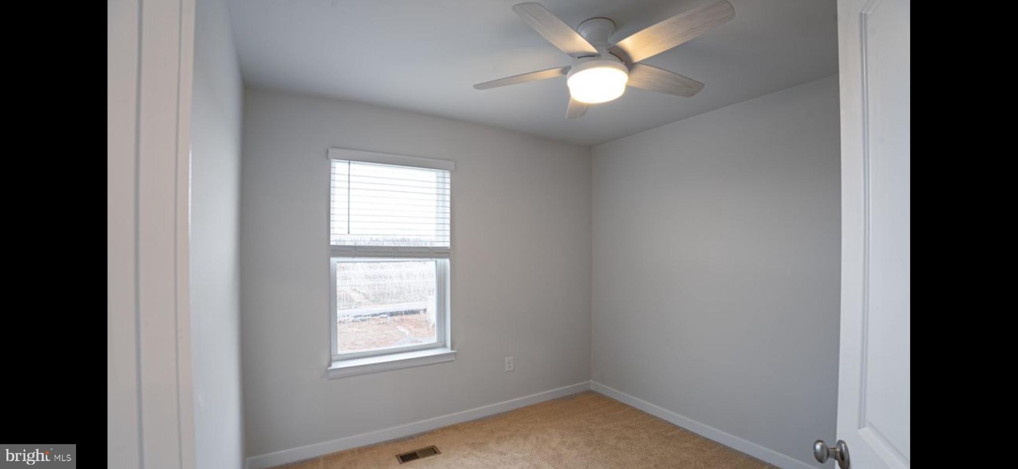 409 Eclipse Street Ranson, WV 25438 - Photo 7 of 14 Bright and airy room with natural light.