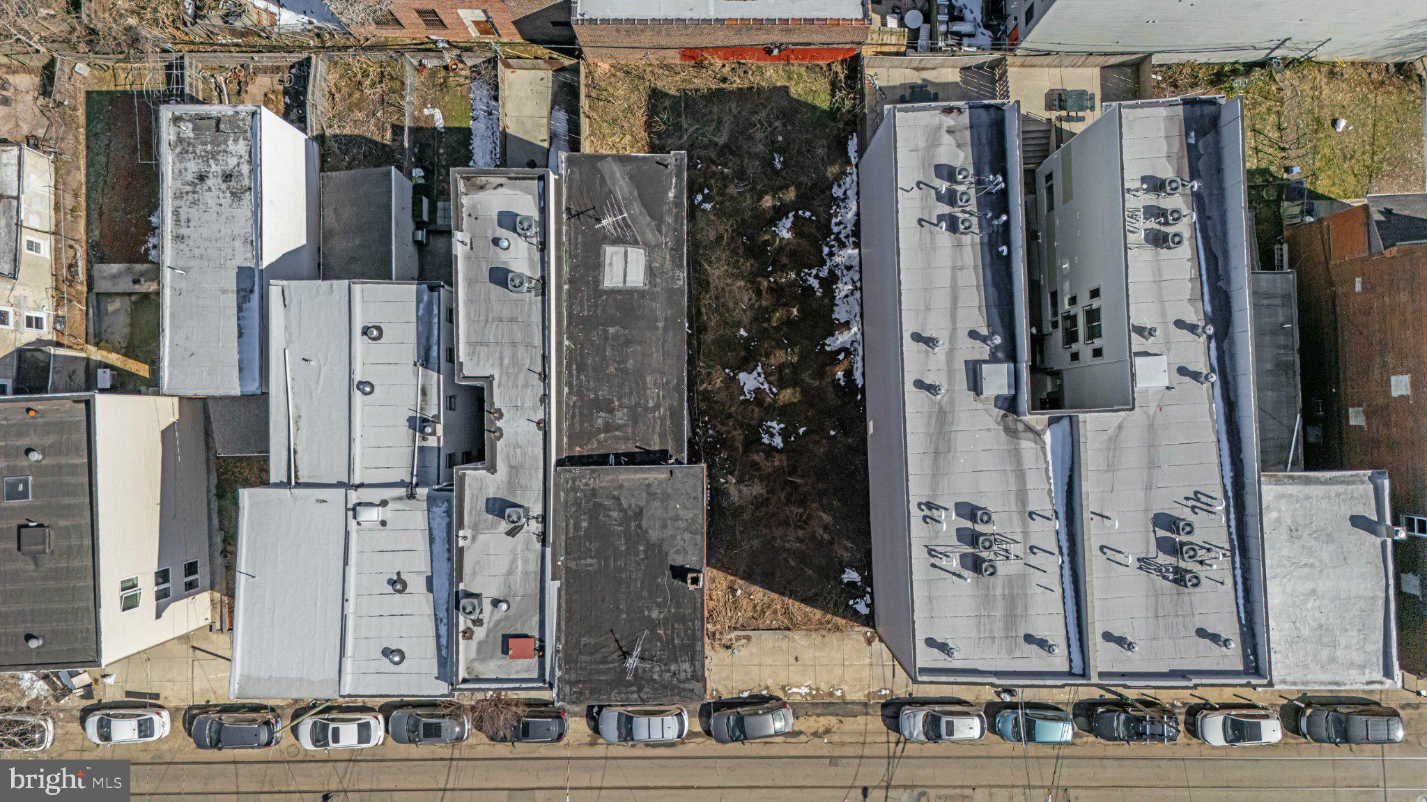 413 North 41st Street, Unit B Philadelphia, PA 19104 - Photo 16 of 17 Urban rooftops and vacant lot view.