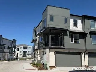 a front view of a house with a street