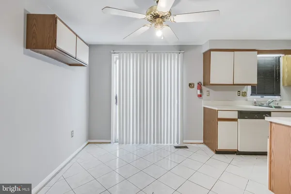 a view of a kitchen with electric appliances