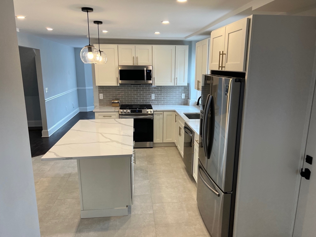 79 Robert Street, Unit 1 Boston, MA 02131 - Photo 3 of 10