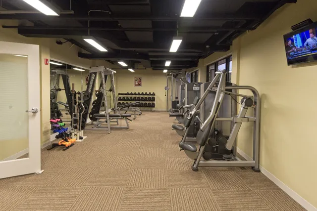 a view of lawn chairs and dinning table and longer chairs