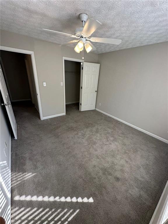 3993 Paloverde Drive Kennesaw, GA 30144 - Photo 20 of 25 a view of an empty room with a ceiling fan