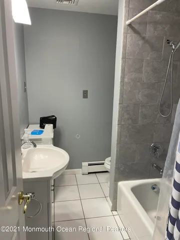 a view of a wooden fence and trees