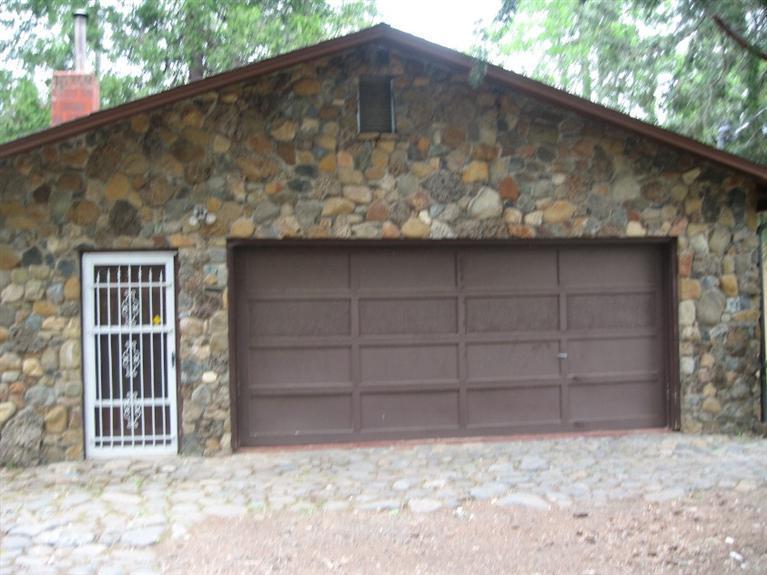 4988 Holland Loop Road Cave Junction, OR 97523 - Photo 5 of 35 a backyard of a house