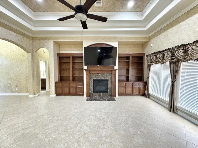 a view of a hallway with a chandelier