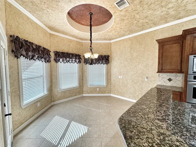 a view of a kitchen cabinets