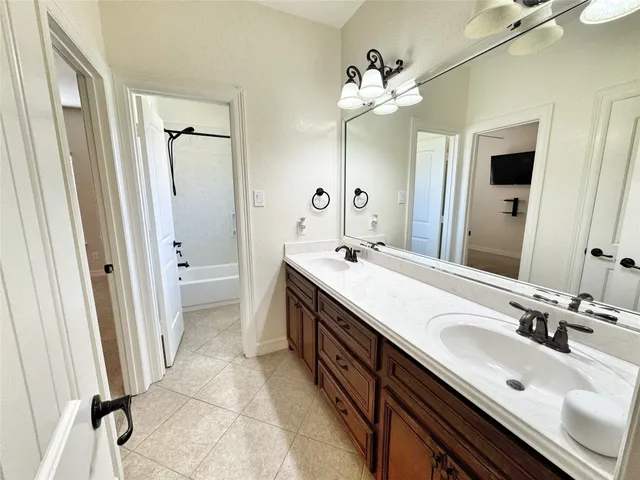 a bathroom with a toilet and a bathtub