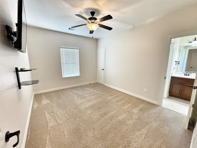 a view of a livingroom with a flat screen tv
